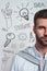 Full of ideas. Vertical half face portrait of a confident bearded man in blue shirt looking at camera while standing