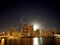 Full Large Moon raises over Waikiki hotels and Marina at Night