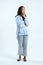 full leght shoot of pensive asian indonesian woman on isolated background
