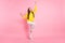 Full length body size photo of charming cute attractive pretty sweet lovely girlfriend dancing wearing yellow bright