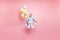 Full length body size photo of cheerfu positive cute nice screaming funny comic girl holding balloons with hands