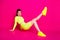 Full length body size photo of cheerful sportswoman exercising keeping leg up smiling isolated on bright pink color