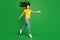 Full length body size photo dreamy girl brunette hair jumping up smiling isolated vivid green color background