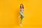 Full length body size photo of girl standing tiptoe amazed touching cheekbones isolated on bright yellow color