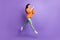 Full length body size photo of jumping ballerina using cellphone in casual clothes isolated on vivid purple color