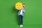 Full length body size photo of man keeping smile icon yellow happy face isolated bright green color background