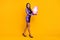 Full length body size photo of pretty woman receiving girt on new year in stilettos violet dress isolated vibrant yellow