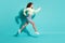 Full length body size side profile photo of beautiful girl jumping high hurrying up isolated on vibrant teal color