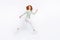 Full length body size side profile photo young woman red hair jumping high running on sale  white color