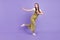 Full length body size view of attractive cheerful girl resting dancing having fun  over purple violet color