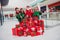 Full length body size view of attractive cheerful group elfs buying giftboxes eve advent December bargain at store