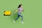 Full length body size view of attractive cheery girl jumping carrying bag running flight isolated on bright green color