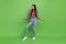 Full length body size view of attractive dreamy cheerful girl dancing chill out isolated over green pastel color