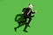 Full length body size view of classy chic motivated man wearing panda mask jumping running isolated over bright green