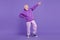 Full length body size view of cool cheerful man pointing clubbing having fun isolated over bright violet purple color