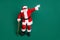 Full length body size view of his he nice attractive cheery childish playful funky Santa leaning on cane having fun