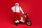 Full length body size view of his he nice bearded cheerful cheery funky cool Santa Claus hipster with motor bike winter