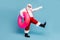 Full length body size view of his he nice cool cheerful cheery fat Santa walking carrying pink life buoy pool party