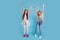 Full length body size view portrait of two people nice lovely attractive cheerful crazy straight-haired pre-teen girls