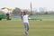 Full length of cricketer playing on field during sunny day, Cricketer on the field in action, Players playing cricket match at fie