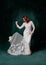 full length of joyful middle aged bride in white wedding dress