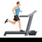 Full length of a man running on a treadmill
