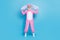 Full length photo of astonished man dressed pink rabbit costume arms hold ears impressed staring isolated on blue color