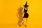 Full length photo of charming cute mysterious young lady hands hips evil smiling cast big dark shadow fall theme event