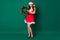 Full length photo of cute adorable lady hold newyear season circle christmas tree door house entrance decor tradition