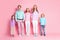 Full length photo of dream idyllic family portrait mother father and preteen small kids younger older siblings hold hand