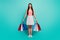 Full length photo energetic astonished girl shopping center client hold bags enjoy unbelievable discounts scream wow omg