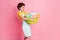 Full length photo of frustrated girl hold heavy dirty clothes basin wear yellow dotted skirt  pastel color