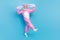 Full length photo of funky carefree retired guy wear pink hare sleepwear walking holding ears isolated blue color