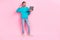 Full length photo of nice young guy hold laptop thumb up professional coder wear trendy blue outfit isolated on pink