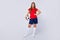 Full length photo positive cheerful footballer girl hold foot ball ready play world final championship soccer tournament