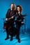 Full length photo positive two people rock band man play bass guitar woman sing song mic composition have world tour