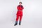 Full length photo of shiny positive young woman paramedic wear red jacket smiling arms crossed isolated white color