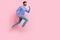 Full length photo of sweet funny arabian man wear long sleeve shirt holding gadget jumping running isolated pink color
