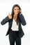 Full length portrait of Attractive latin corporate latin woman talking on smart phone and making thumb up sign in Creative success