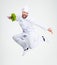 Full length portrait of a cheerful chef cook dancing