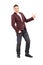 Full length portrait of a fashionable smiling guy pointing with