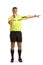 Full length portrait of a football referee blowing a whistle and pointing with finger