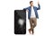 Full length portrait of a guy pointing up and posing with a big smartphone with cracked screen