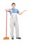Full length portrait of a male cleaner with a broom gesturing