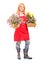 Full length portrait of a middle aged female florist holding flo