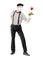 Full length portrait of a mime asrtist giving a rose flower