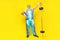 Full length portrait of positive sportive person put arm waist hold barbell powerlifting isolated on yellow color