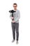 Full length portrait of professional videographer holding dslr camera on 3-axis gimbal isolated on white