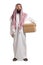 Full length portrait of a saudi arab man in a thobe holding a cardboard box