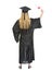 Full length portrait of woman in graduation gown